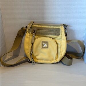 Sherpani Yellow Crossbody Bag with Olive Accents. 10 by 9